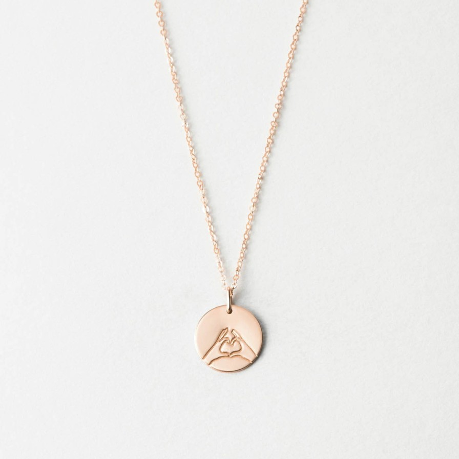 Categories GLDN | Hand Heart Necklace